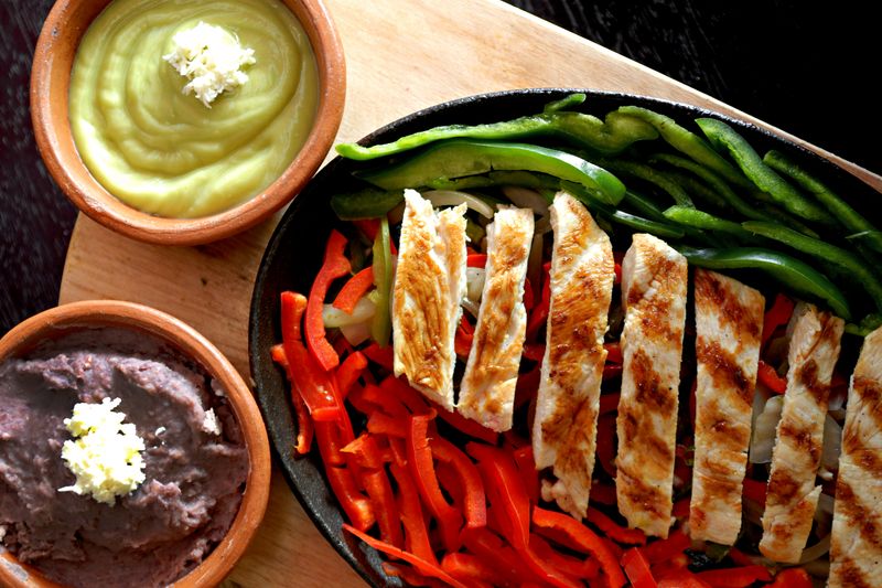 Chuys breakfast tacos spread with fresh ingredients